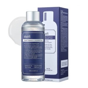 Klairs Supple Preparation Unscented Toner in a transparent blue bottle beside its blue and white product packaging.
