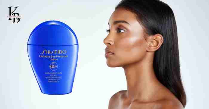 Missha sunscreen bottle with dewy skin background